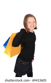 Pretty 10 Year Old Girl With Shopping Bags Isolated On A White Background