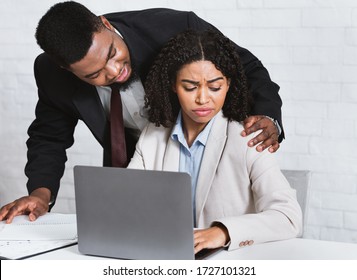 Pretty African American Employee Being Victim Of Sexual Harassment At Worlplace