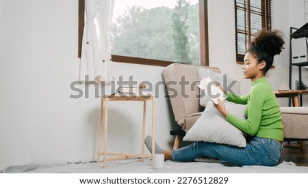 Pretty african american girl feeling fatigue lounge at sofa, happy calm lady dream enjoy wellbeing breathing fresh air in summer free time holiday.