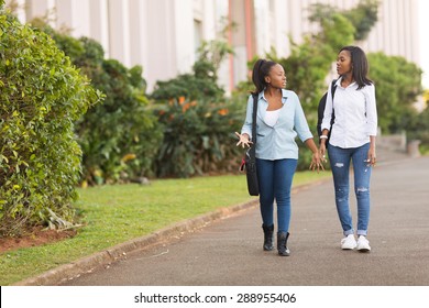 Pretty African College Students Walking Together On Campus