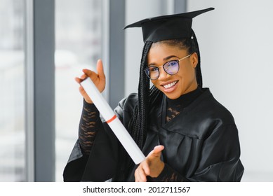 Pretty African Female College Graduate At Graduation