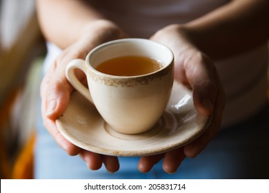 Pretty Asian Woman Drinking Tea For Health.