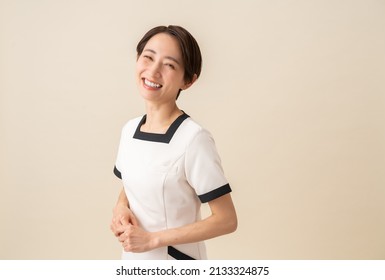 Pretty Asian woman in uniform
