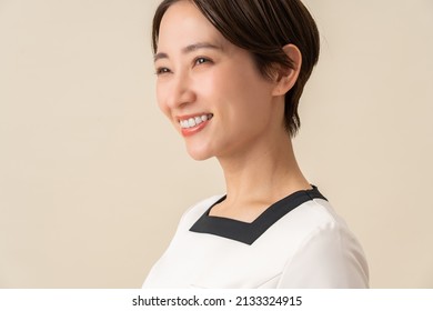 Pretty Asian woman in uniform - Shutterstock ID 2133324915