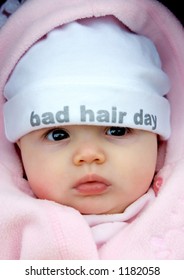 Pretty Baby Girl With Funky Hat On That Says Bad Hair Day