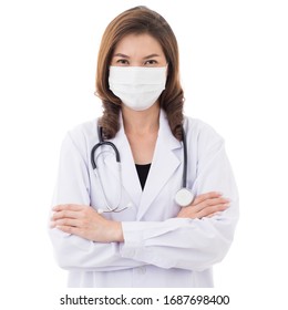 Pretty Beautiful Asian Woman In Doctor Gown Or Lab Coat  Wearing Surgical Hygiene Mask Standing With Crossed Arms And Looking At Camera Isolated On White Background. There Are Copy Space For Text.