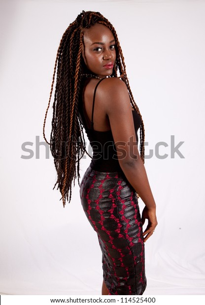 Pretty Black Woman Dreadlocks Looking Camera Stockfoto