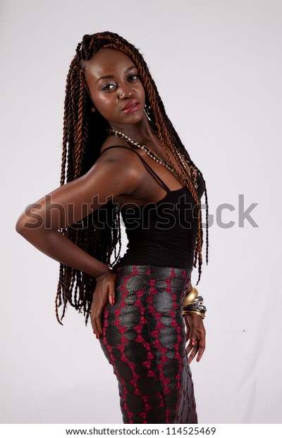 Pretty Black Woman Dreadlocks Looking Camera Stockfoto