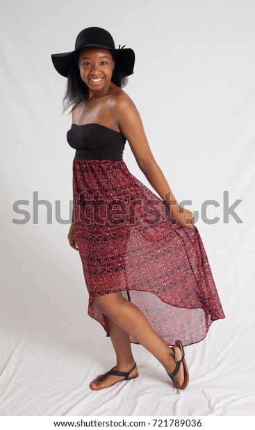black woman in sundress