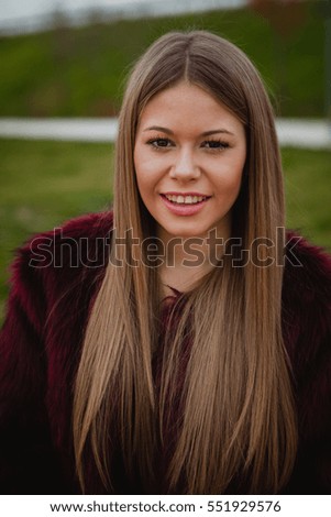 Similar – Pretty blonde girl with fur coat