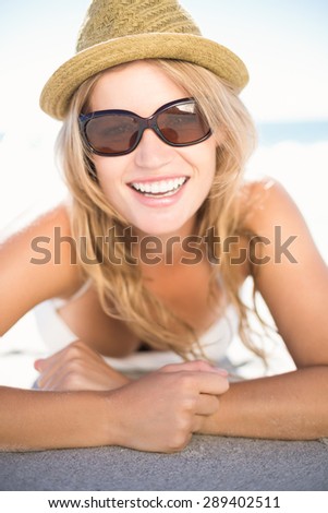 Similar – Woman applying sunscreen by the pool during summer