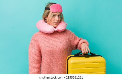 Pretty Blonde Woman Feeling Sad, Upset Or Angry And Looking To The Side. Flight Passenger Concept