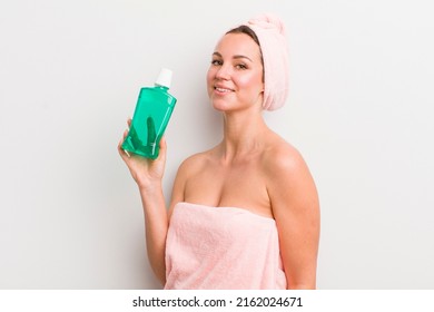 Pretty Blonde Woman With A Mouth Wash Bottle