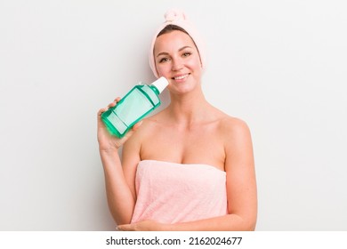 Pretty Blonde Woman With A Mouth Wash Bottle