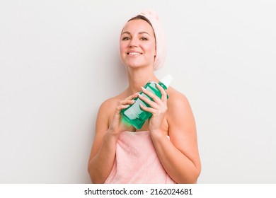 Pretty Blonde Woman With A Mouth Wash Bottle