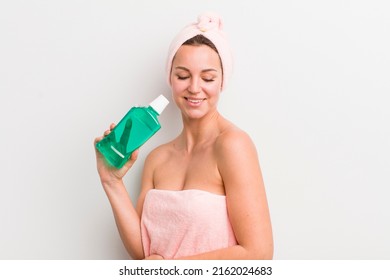 Pretty Blonde Woman With A Mouth Wash Bottle