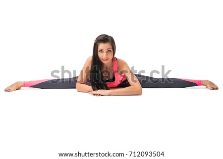 Pretty brunette doing yoga isolated shot on white