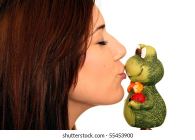 Pretty Brunette Girl Kissing A Toy Frog