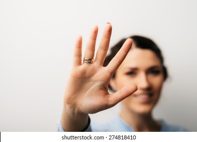 Pretty Brunette Girl Showing Five Fingers