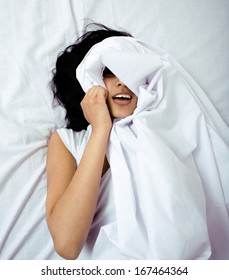 pretty brunette woman in bed, cant sleep - Shutterstock ID 167464364