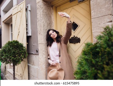 Pretty Brunette Woman Takes Selfie On Her IPhone