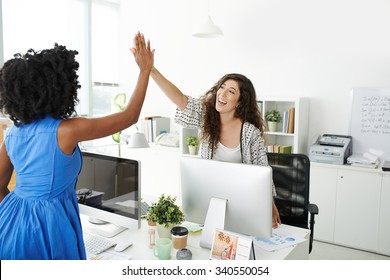 Pretty Business Lady Giving High Five To Her Colleague