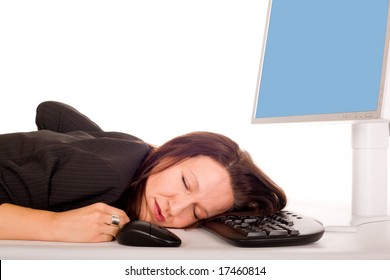 pretty business woman is sleeping on computer keyboard