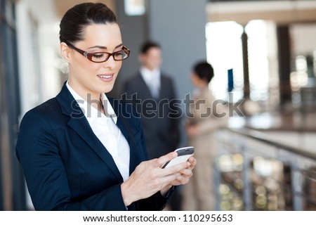 pretty businesswoman using smart phone