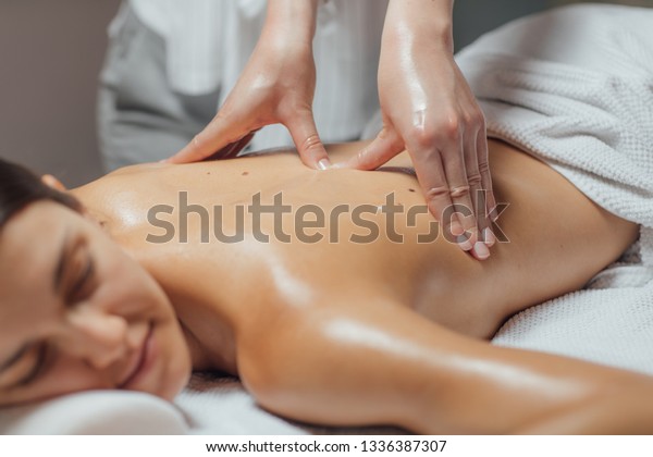 Naked Client Enjoys Relaxing Sex Massage on Table