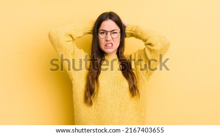 pretty caucasian woman feeling frustrated and annoyed, sick and tired of failure, fed-up with dull, boring tasks