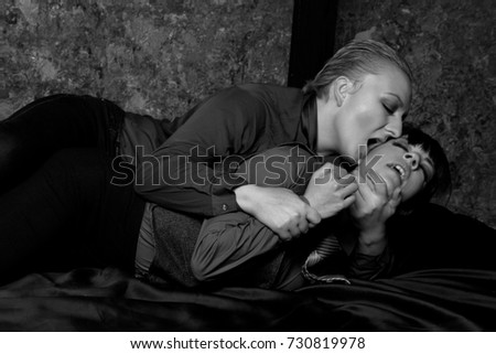 Lesbian having sex on bed