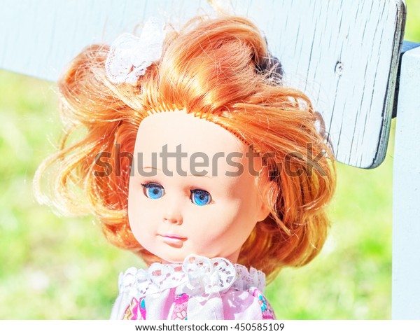 doll with red hair and freckles