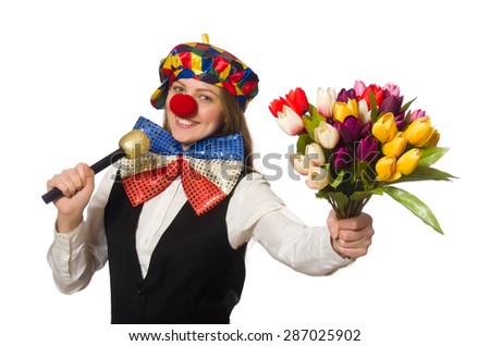 Pretty female clown with flowers isolated on white