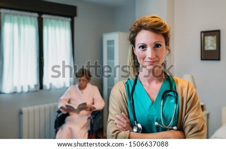 Similar – Pretty female doctor in a geriatric clinic with elderly woman in wheelchair