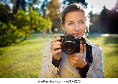 Pretty Female Photographer Outdoors