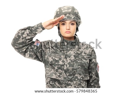 Pretty female soldier saluting on white background