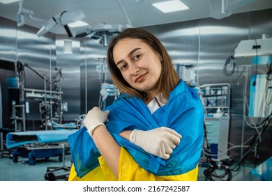 Pretty Female Surgeon Or Nurse Poses And Supports Peoples In The Ukrainian Flag During The War With Russia. Global Support For Ukraine