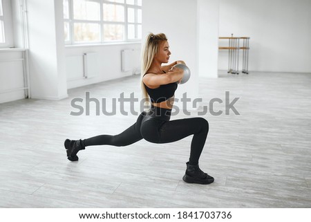 Similar – Image, Stock Photo young woman foam rolling after exercise in gym