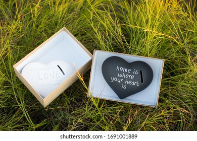 Pretty gift of a heart-shaped money box.