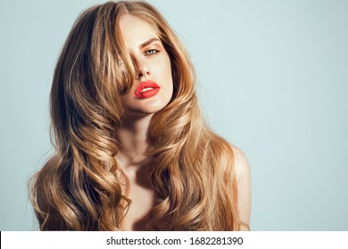 Pretty Girl With Big Hair Volume Red Lips And Blue Eyes