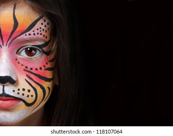 Pretty Girl With Face Painting Of A Tiger