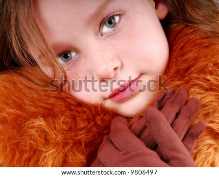 Pretty Girl in Fur Coat and Gloves