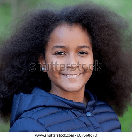 Similar – Cute African American girl smiling in the street with afro hair