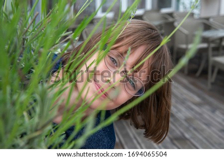 Similar – Lachend im Gras liegend, Augen geschlossen.