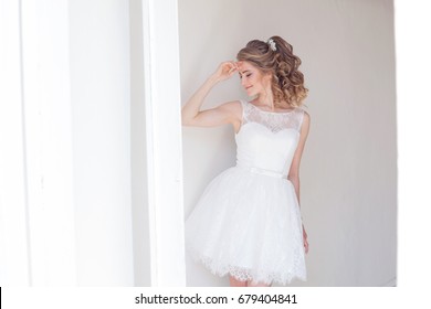 Pretty Girl In A Short White Wedding Dress