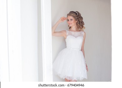 Pretty Girl In A Short White Wedding Dress