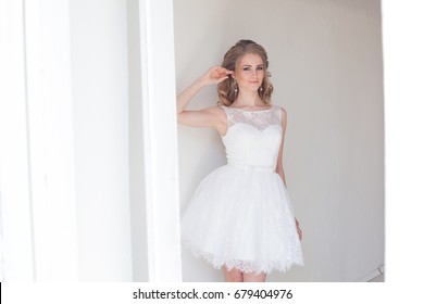 Pretty Girl In A Short White Wedding Dress