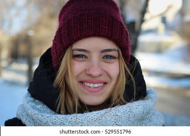 Pretty girl with streaming eyes from the cold