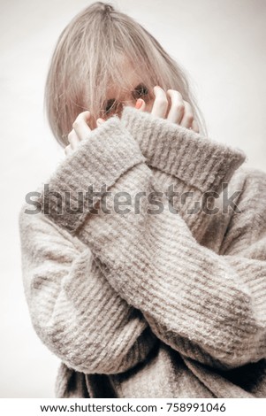 Similar – Young blonde woman with a headache