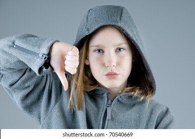 pretty girl voting no with thumb - Powered by Shutterstock